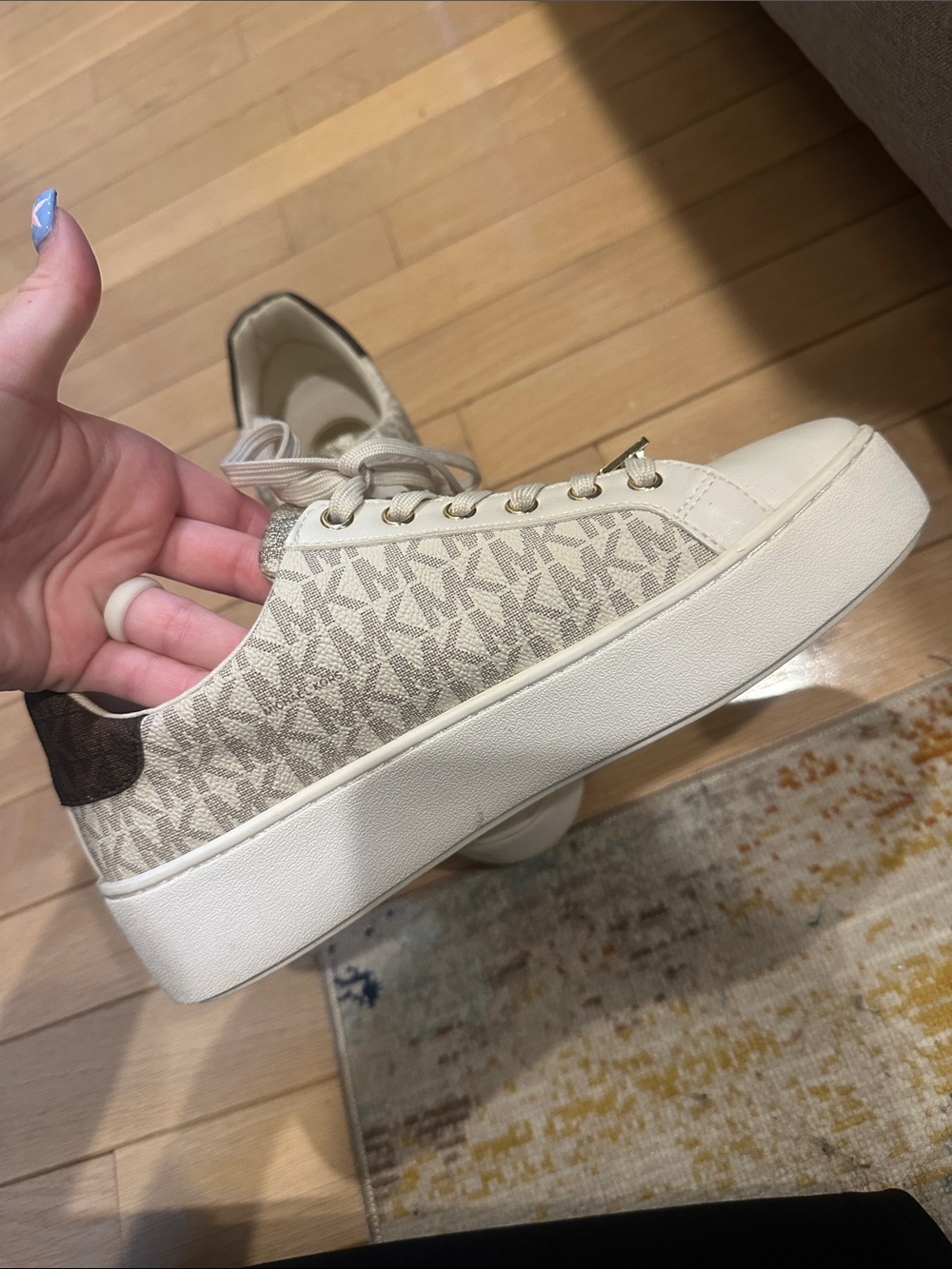Michael Kors Cream and Gold MK Logo Low-Top Sneakers - Picture 7 of 12